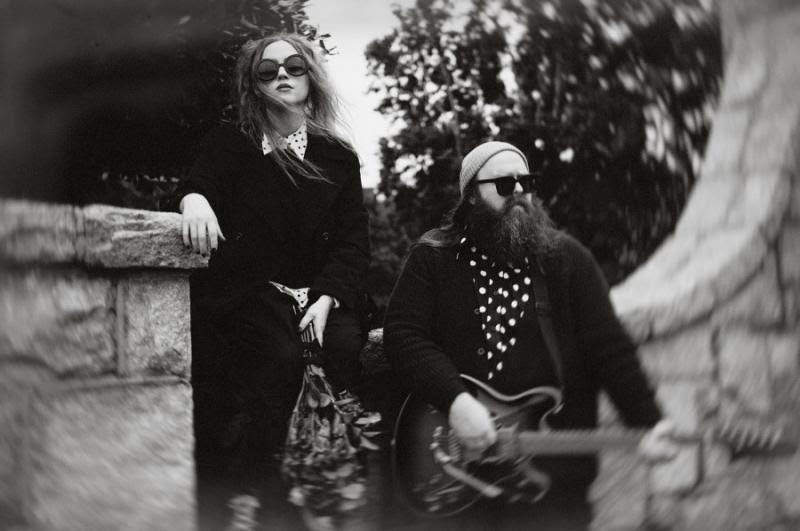 The duo of the Silk Daisys pose for a photo